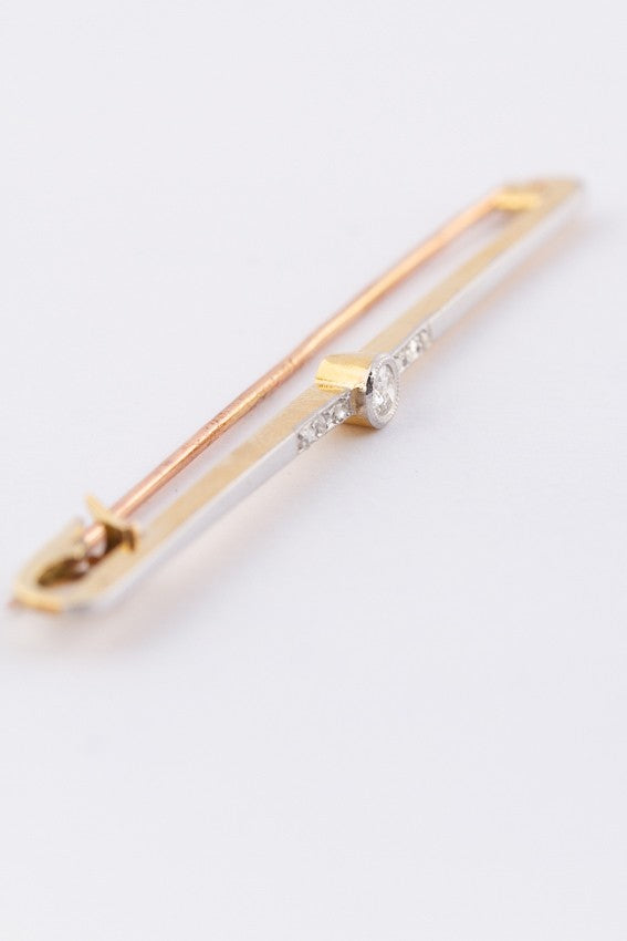 White/yellow gold brooch with a brilliant and rose cut diamond
