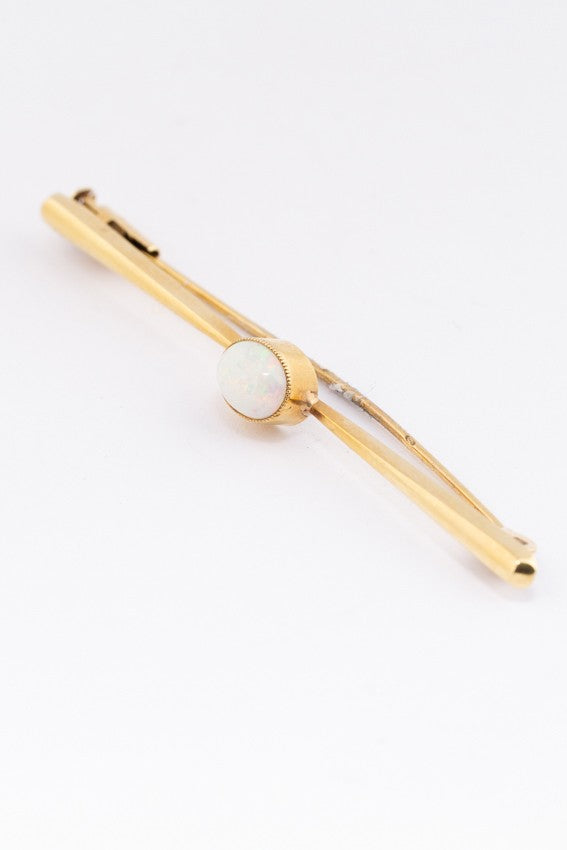 Golden brochette with milk opal