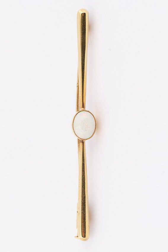 Golden brochette with milk opal