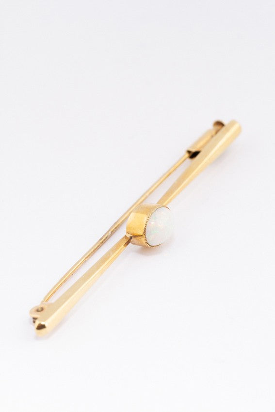 Golden brochette with milk opal