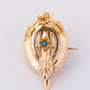 Antique gold brooch with turquoise