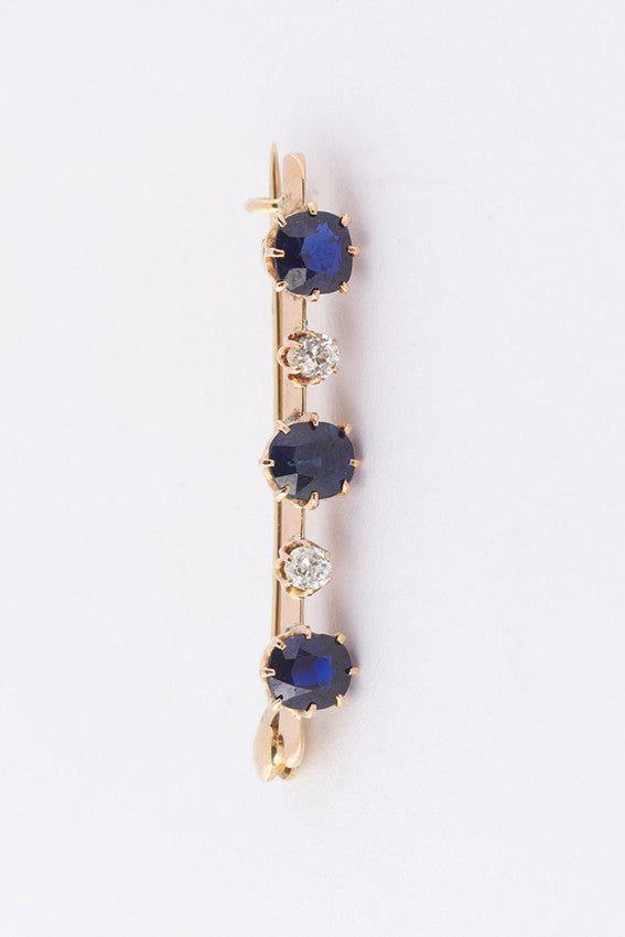 Antique gold brooch with blue spinel and brilliant