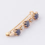 Antique gold brooch with blue spinel and brilliant