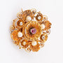 Antique gold brooch with spinel and diamonds