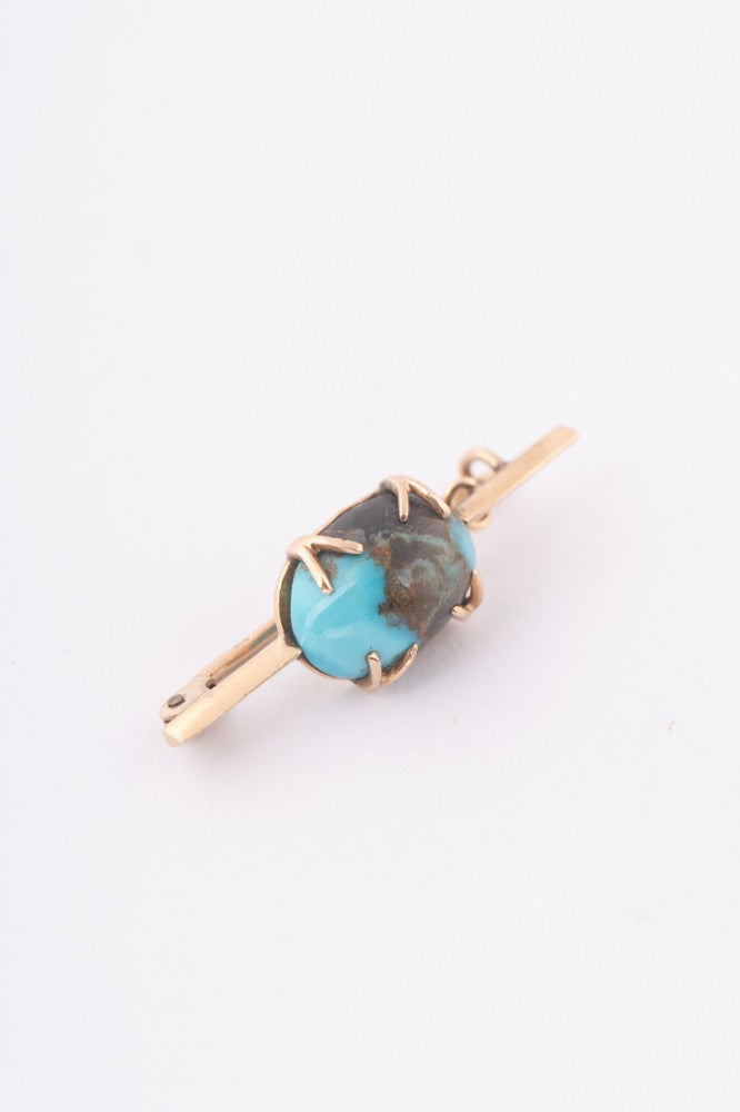 Antique gold brooch with turquoise