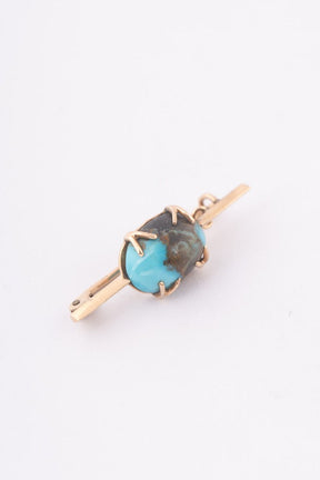 Antique gold brooch with turquoise