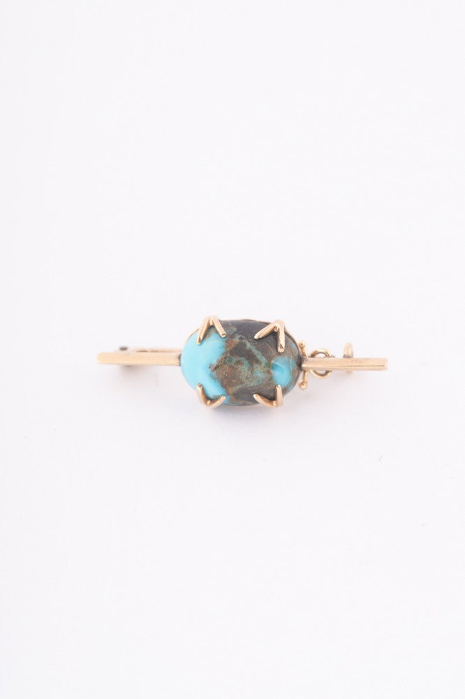 Antique gold brooch with turquoise