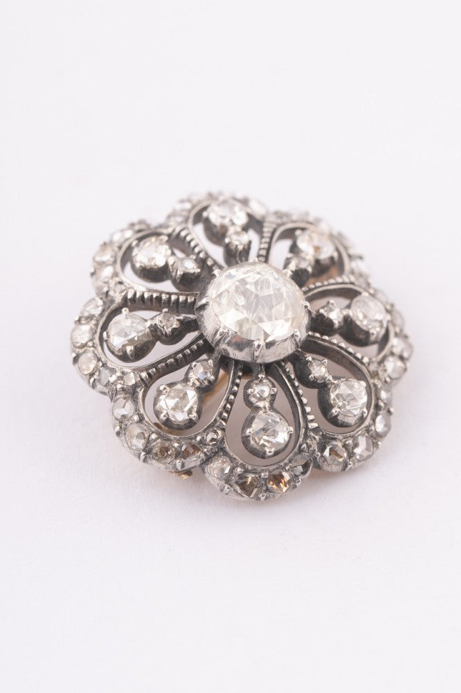 Gold entourage brooch with rose-cut diamonds