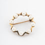 Gold open brooch with cultivated pearls