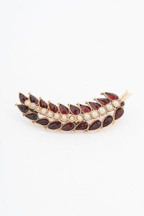 Antique gold feather brooch with pearls and garnet