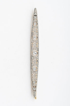 White/yellow gold brooch with 5 brilliant-cut diamonds and rose-cut diamonds