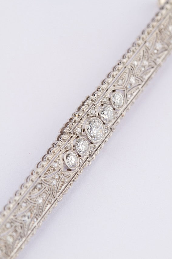 Platinum brochette with brilliants and diamonds