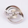 14 carat white gold brooch with 2 brilliants
