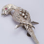 White gold parrot with a ruby ​​and diamonds