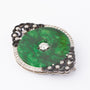 White gold brooch with a brilliant, diamonds, jade and enamel