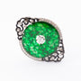 White gold brooch with a brilliant, diamonds, jade and enamel