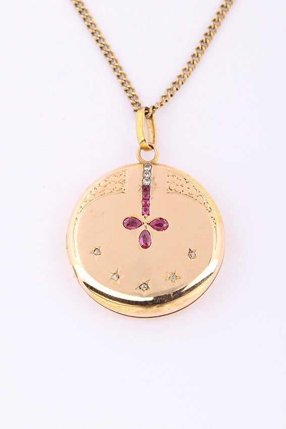 Antiek gouden medaillon met diamant en robijn