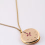 Antiek gouden medaillon met diamant en robijn