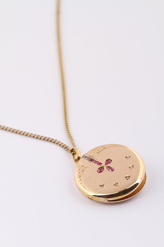 Antiek gouden medaillon met diamant en robijn