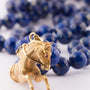 Antiek gouden paard aan laps lazuli collier