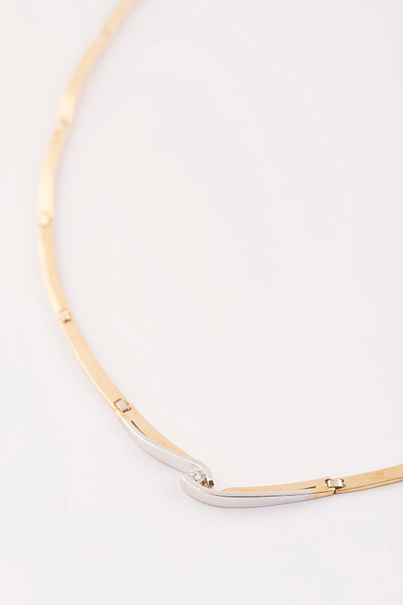 White/yellow gold link necklace with a brilliant