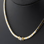 White/yellow gold necklace with a brilliant