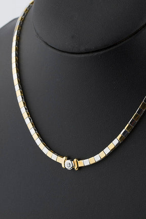 White/yellow gold necklace with a brilliant