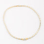 White/yellow gold necklace with a brilliant