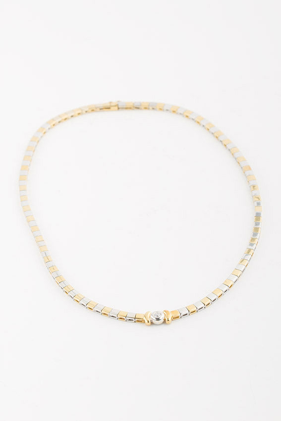 White/yellow gold necklace with a brilliant