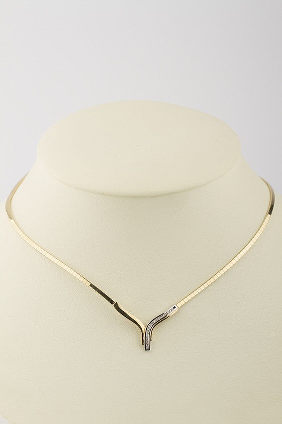White/yellow gold necklace with diamonds