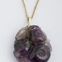 Amethist bloem hanger aan gouden collier