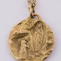 Gouden madonna hanger aan gouden collier