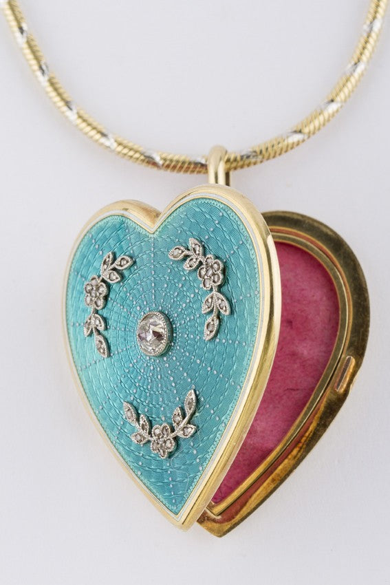 Gouden hart medaillon met briljant en diamant