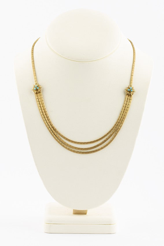 Gouden choker met turkoois