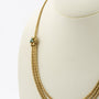 Gouden choker met turkoois