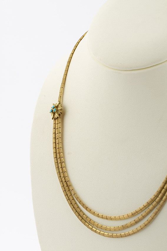 Gouden choker met turkoois