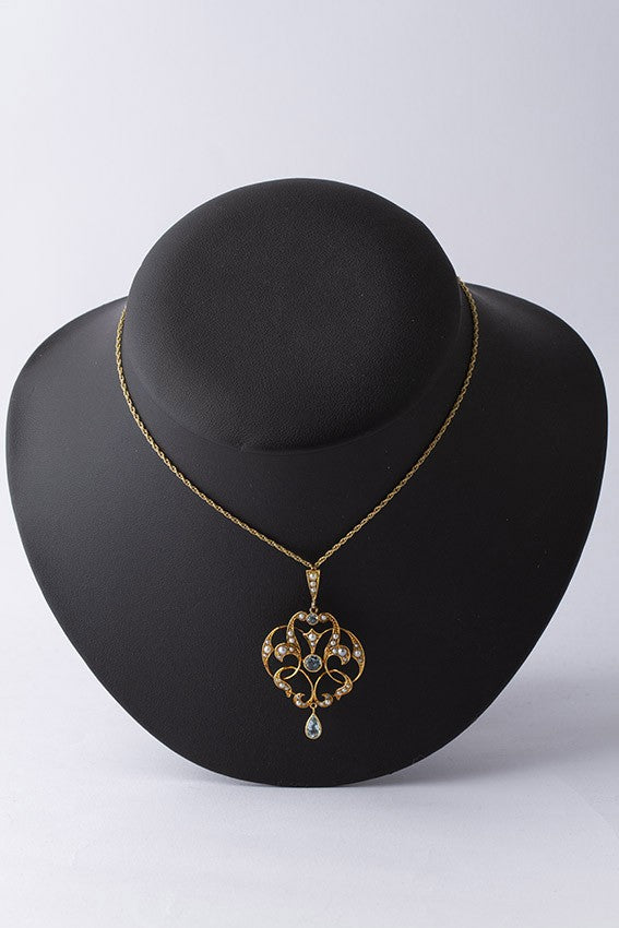 Gold Victorian pendant with aquamarine on necklace
