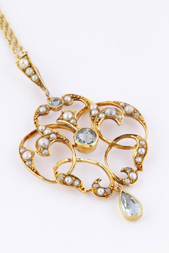 Gold Victorian pendant with aquamarine on necklace