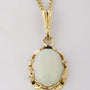 Gouden hanger met opaal aan gouden gourmet collier