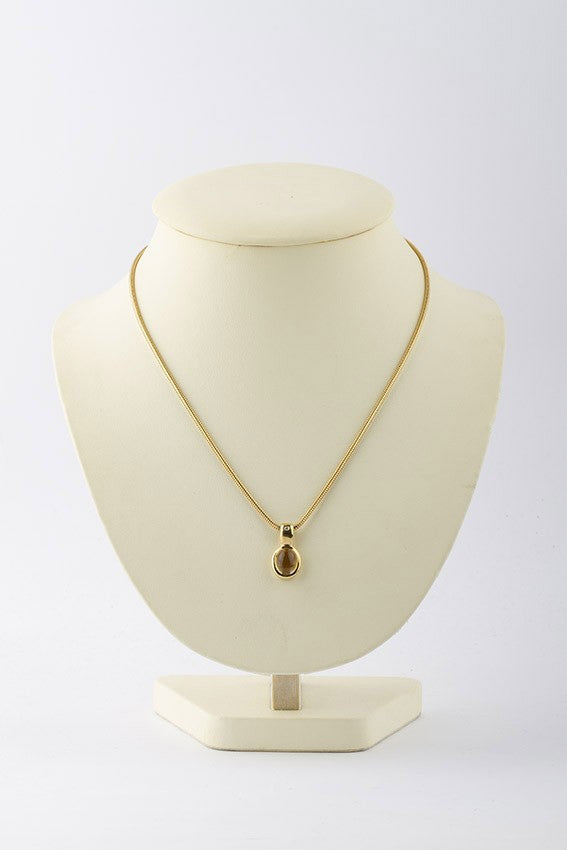 Gouden hanger met citrien en briljant aan slangen collier