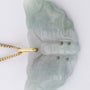 Jade lucky pendant on gold necklace