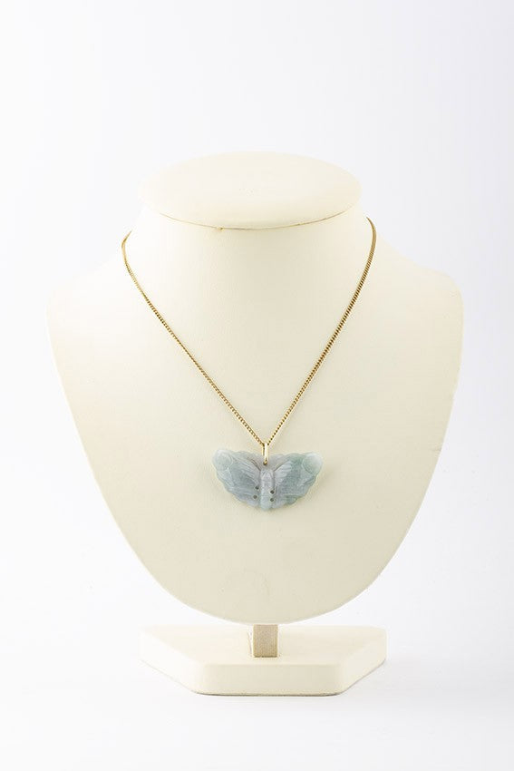 Jade lucky pendant on gold necklace