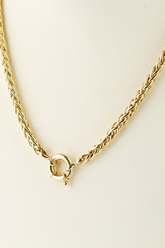 Gouden gevlochten collier.