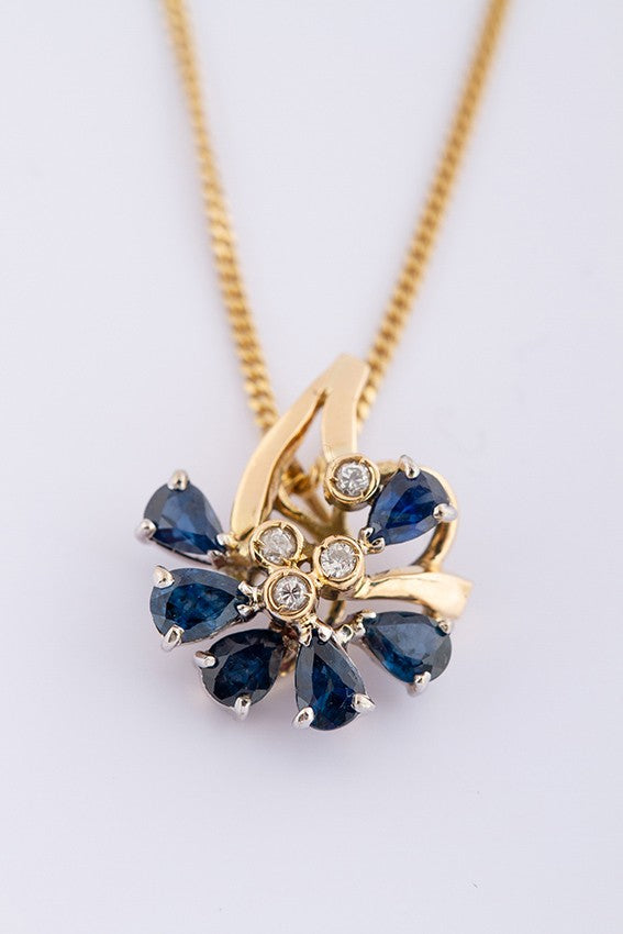 White/yellow gold pendant with brilliant and sapphire