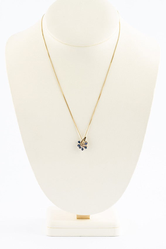 White/yellow gold pendant with brilliant and sapphire