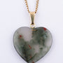 Moss agate heart pendant on gold necklace