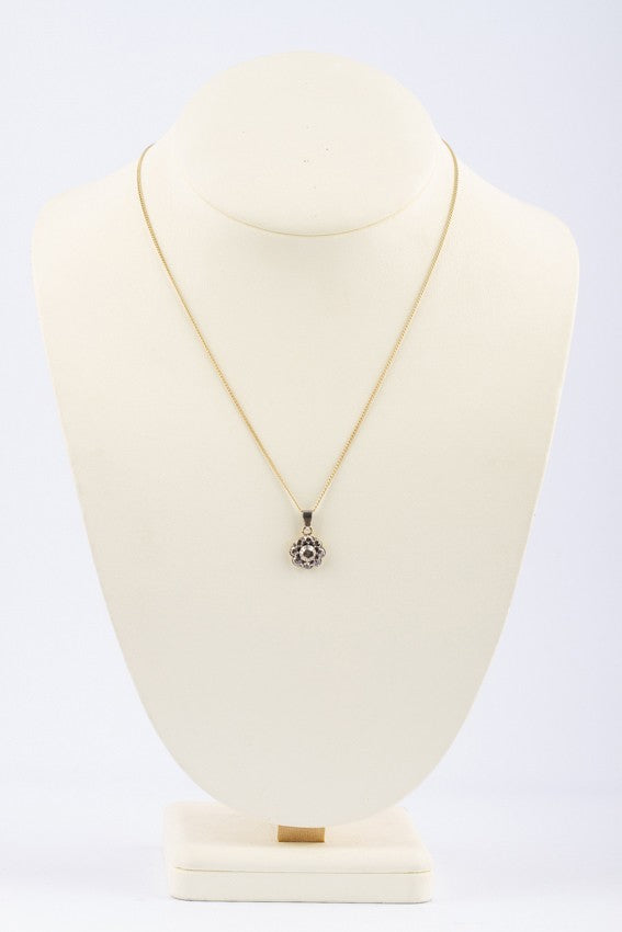 Antique gold pendant with rose-cut diamond