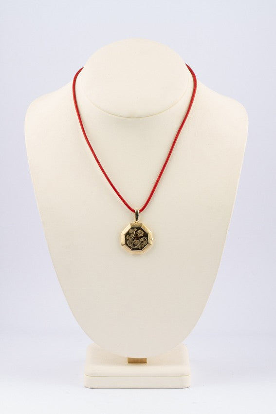 Gouden gegraveerd medaillon