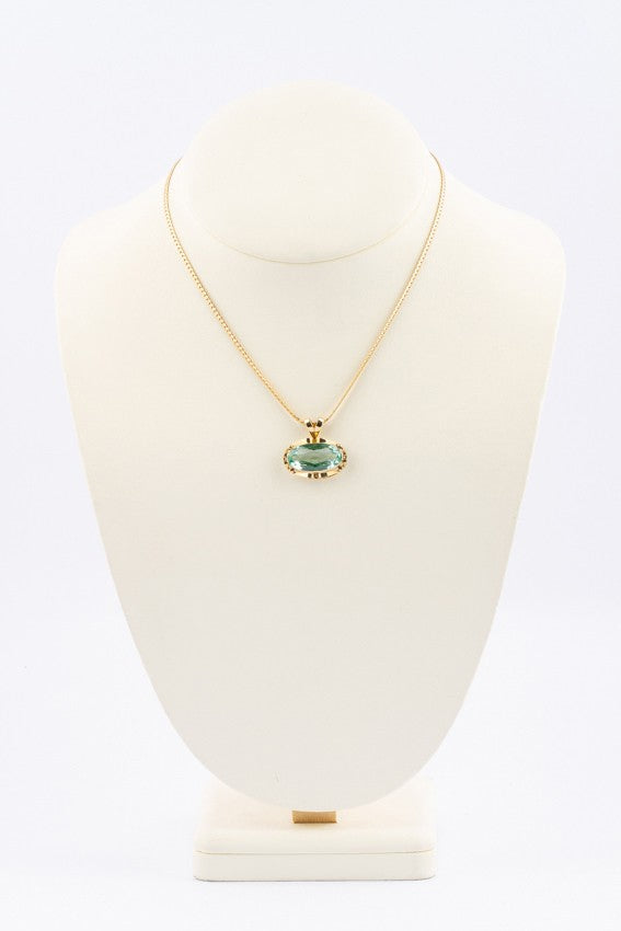 Gouden hanger met een chrysoliet