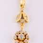 Gold entourage pendant with diamonds on a gold necklace